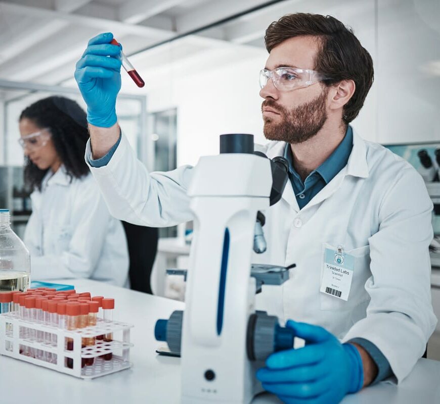 Scientist analysing blood samples in a laboratory supported by global temperature-controlled logistics