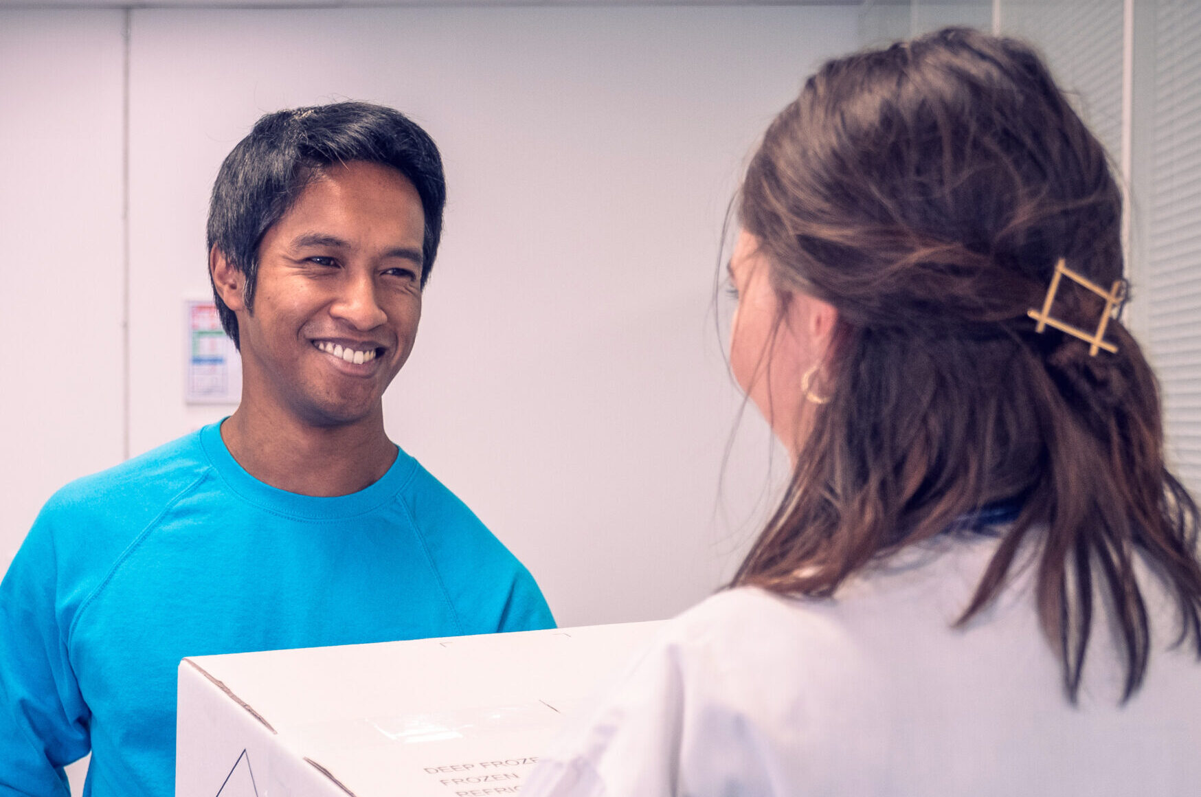 CRYOPDP team member delivering a package to a healthcare professional