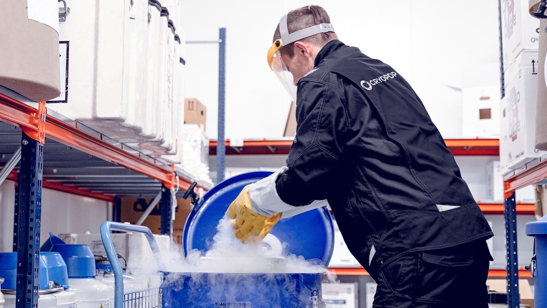 CRYOPDP technician handling liquid nitrogen for cryogenic product supply logistics.