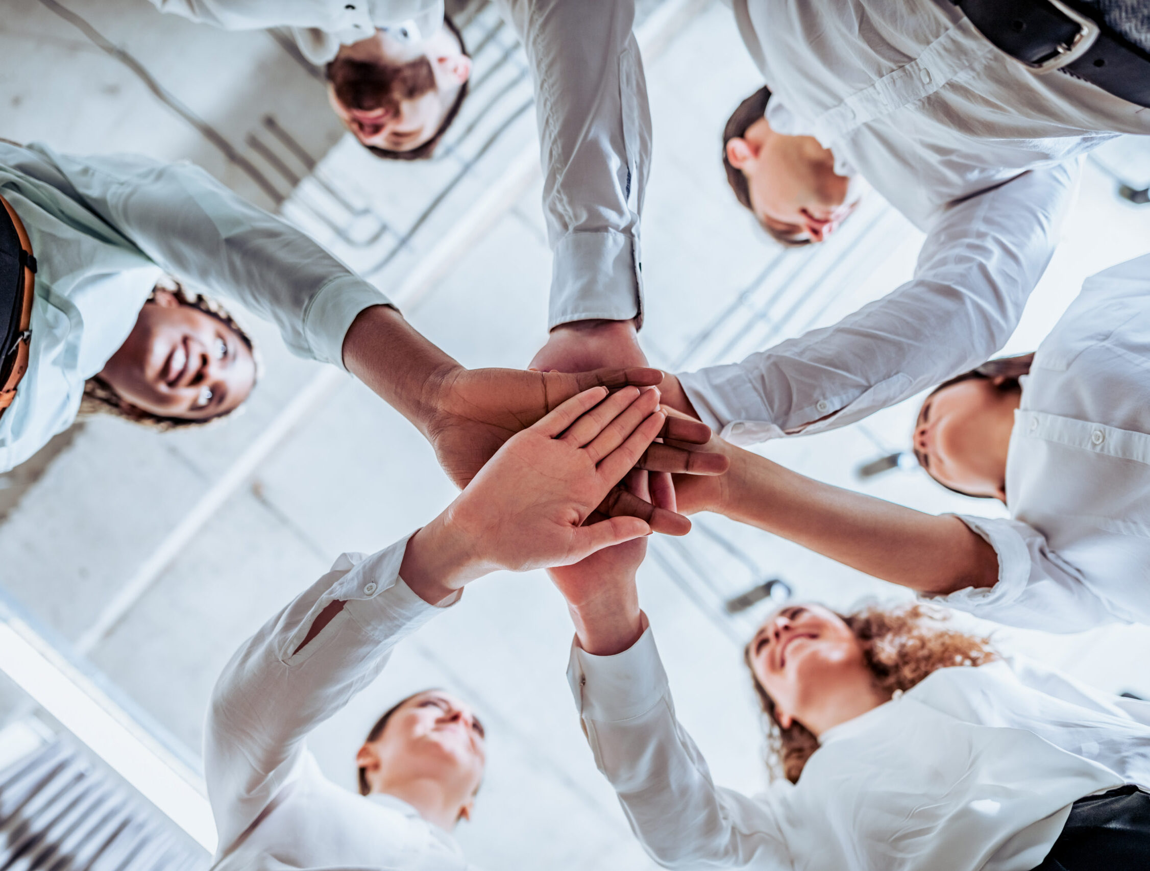 CRYOPDP Team members joining hands to represent unity and purpose