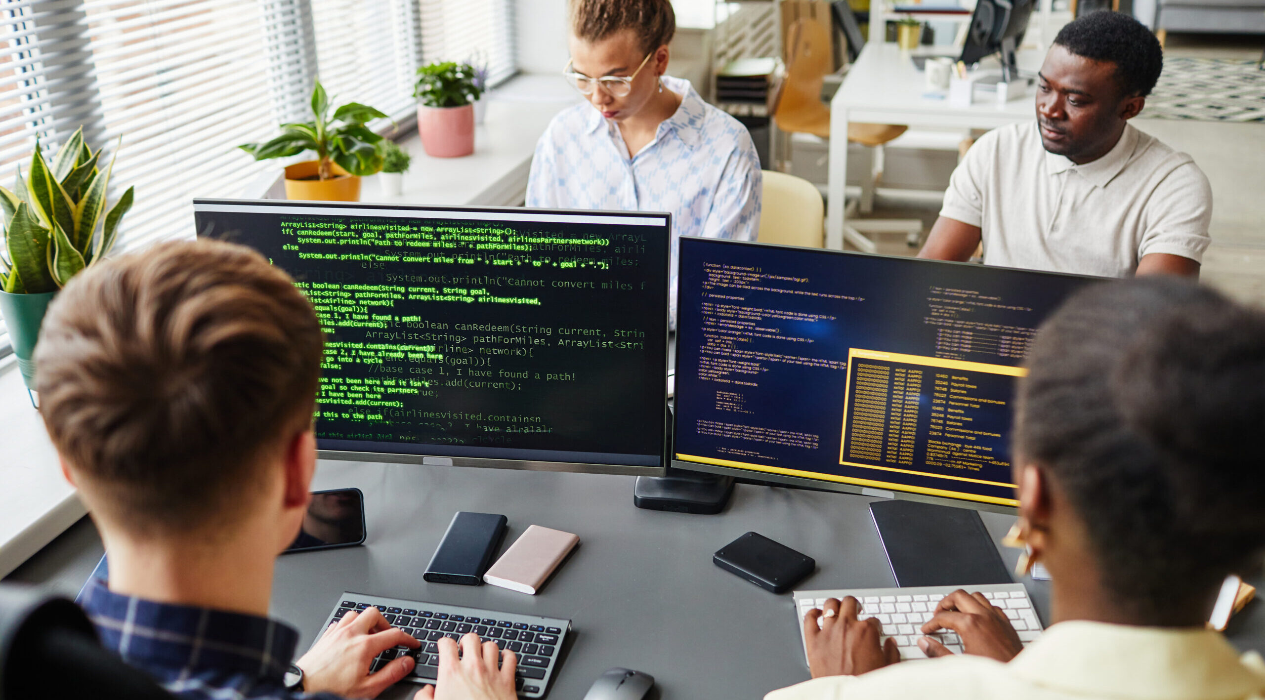 Tech team developing integrated logistics solutions through software and data systems
