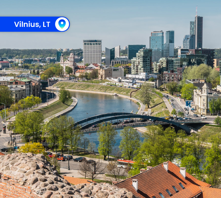 Vilnius city skyline with a view of the river and bridge, representing the location for Life Sciences Baltics 2025.